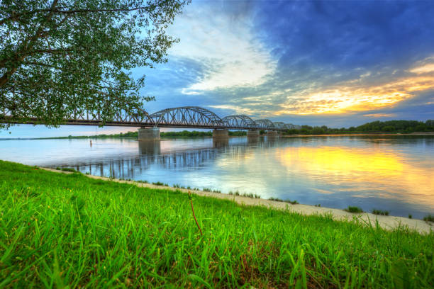 istock Sunset over Vistula river in Grudziadz bridge 895033810