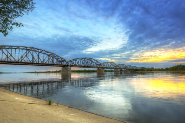 istock Sunset over Vistula river in Grudziadz bridge 895033824