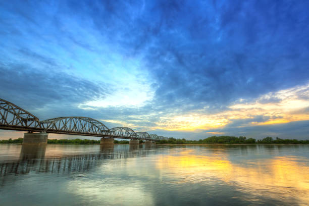 istock Sunset over Vistula river in Grudziadz bridge 895033838