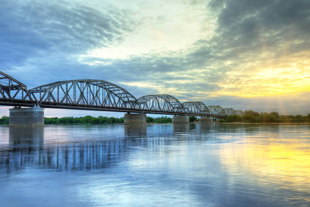 istock Sunset over Vistula river in Grudziadz bridge 895033844