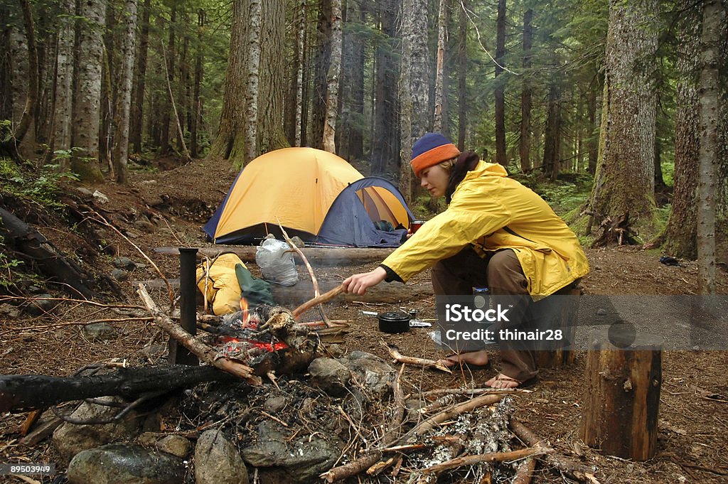 Woman in campsite  Forest Stock Photo
