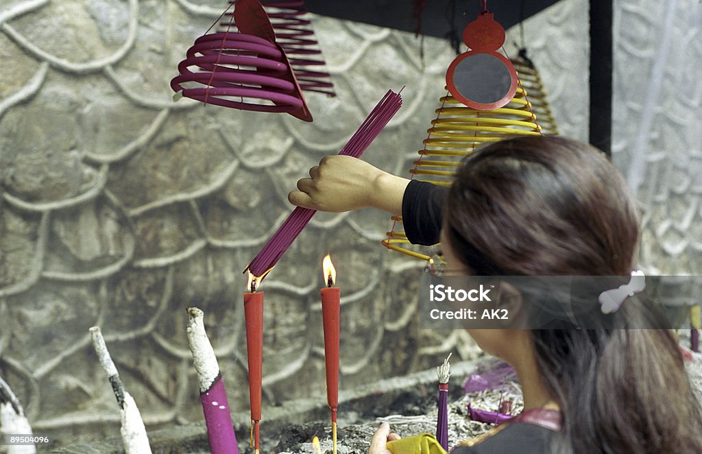 Prayer in a chinese temple  Asia Stock Photo