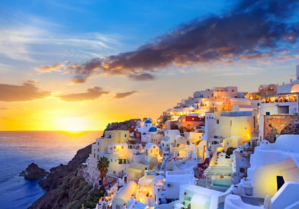 istock Santorini beautiful sunset at village Oia on Greece 895042174