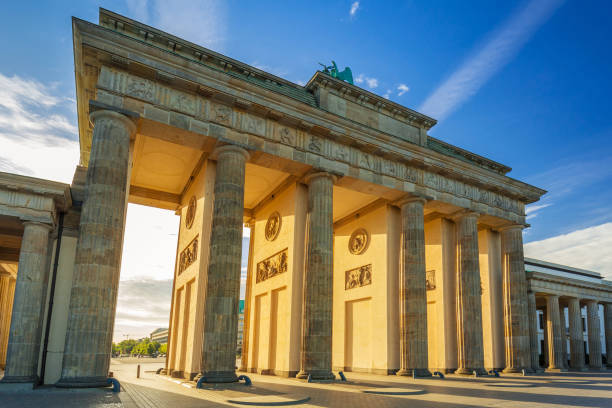istock The Brandenburg Gate in Berlin at sunrise 895042524