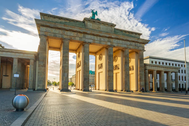 istock The Brandenburg Gate in Berlin at sunrise 895042526