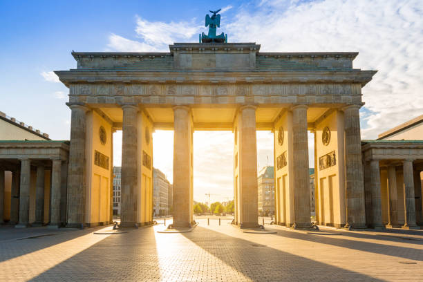 istock The Brandenburg Gate in Berlin at sunrise 895042542