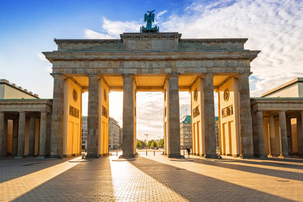 istock The Brandenburg Gate in Berlin at sunrise 895042628
