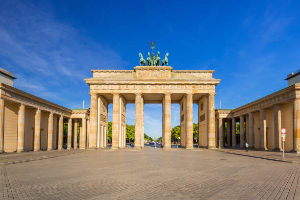istock The Brandenburg Gate in Berlin at sunrise 895042668