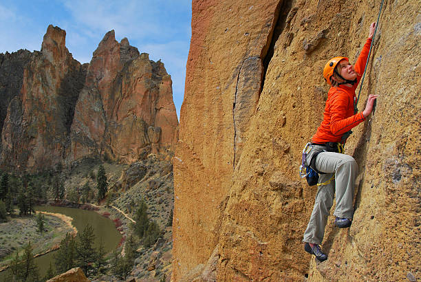 Woman Rock climbing stock photo