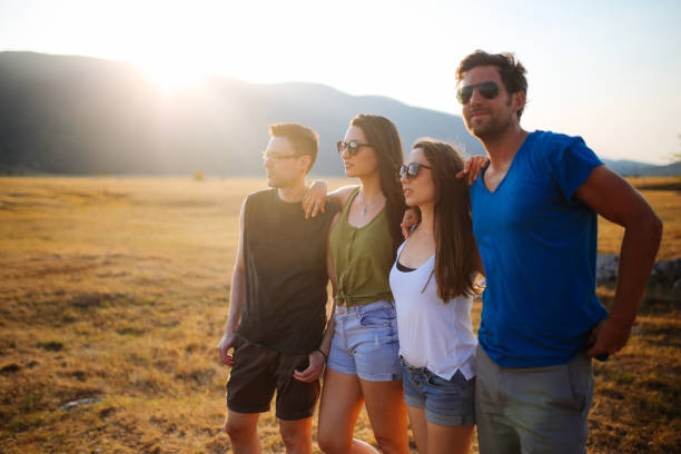 istock Young people enjoying beautiful nature view in the mountains 895047834