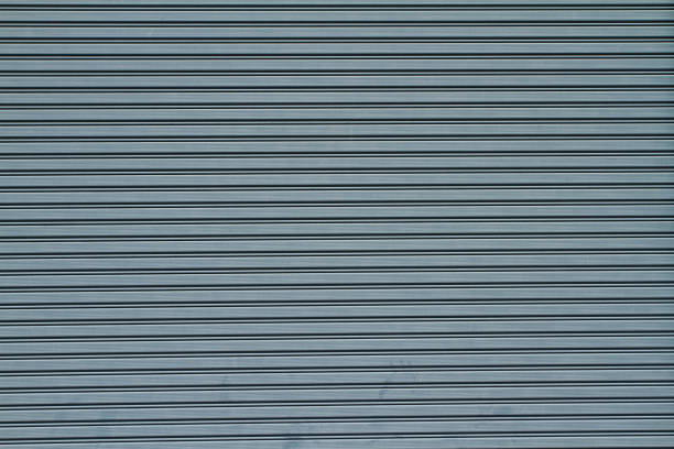 istock Background of metal shutter door. 895047964
