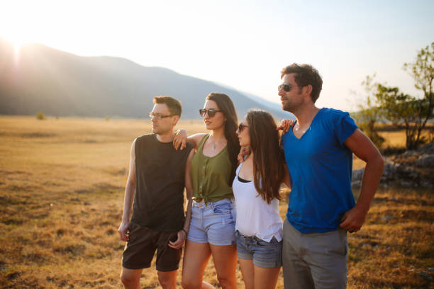 istock Young people enjoying beautiful nature view in the mountains 895048160