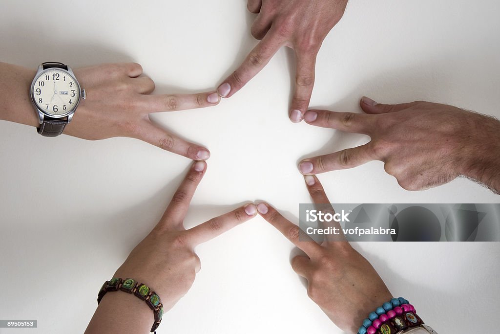 Five teenagers hands form a star  Adolescence Stock Photo