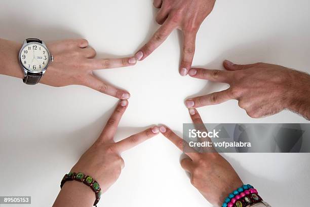 Five Teenagers Hands Form A Star Stock Photo - Download Image Now - Adolescence, Bonding, Bracelet