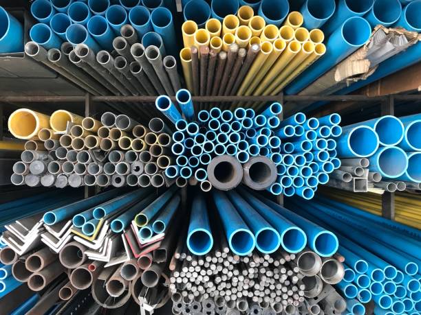 istock PVC pipes stacked in factory. 895058854