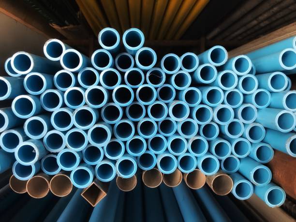 istock PVC pipes stacked in factory. 895058882