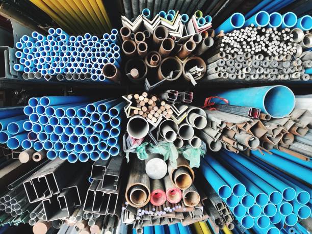 istock PVC pipes stacked in factory. 895059692