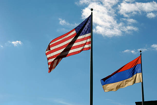 american y armenia flags en día soleado - armenian ethnicity fotografías e imágenes de stock