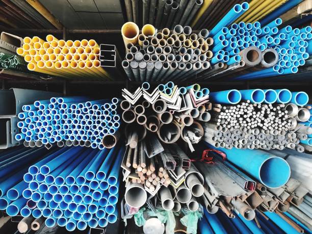 istock PVC pipes stacked in factory. 895060996