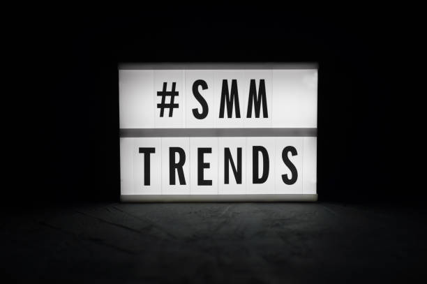 istock SMM Trends  - text on a luminous display in the dark. 895063908