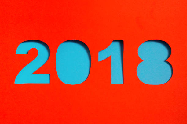 istock 2018 new year cut from red paper 895063964