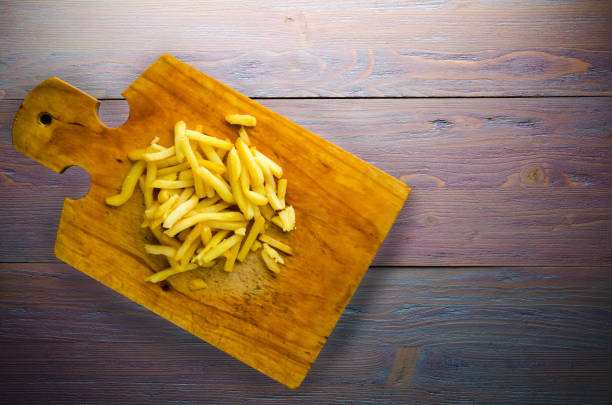 istock fry potatoes on a wooden background 895066494