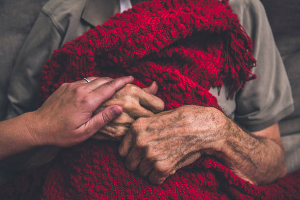 istock Hospice Nurse visiting an elderly male patient 895072222