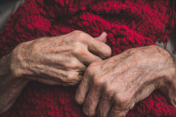 istock Hospice Nurse visiting an elderly male patient 895072324
