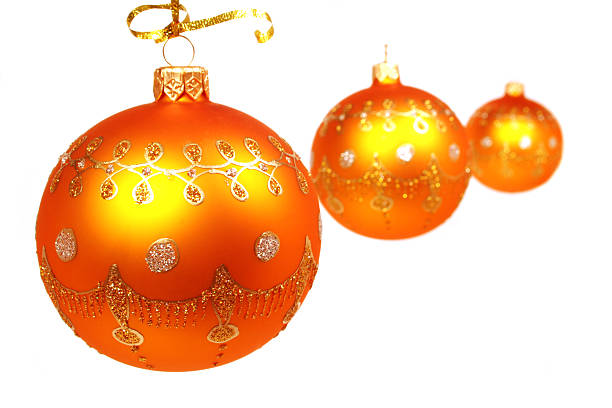 istock Three celebratory spheres of yellow color on white 89507601