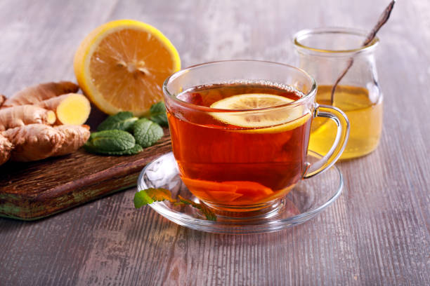 Tea with ginger root Tea with ginger root, lemon and honey, black tea stock pictures, royalty-free photos & images