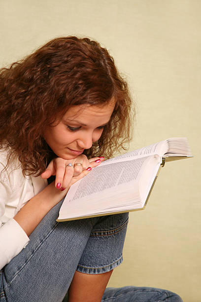 istock Girl with the book 89510070