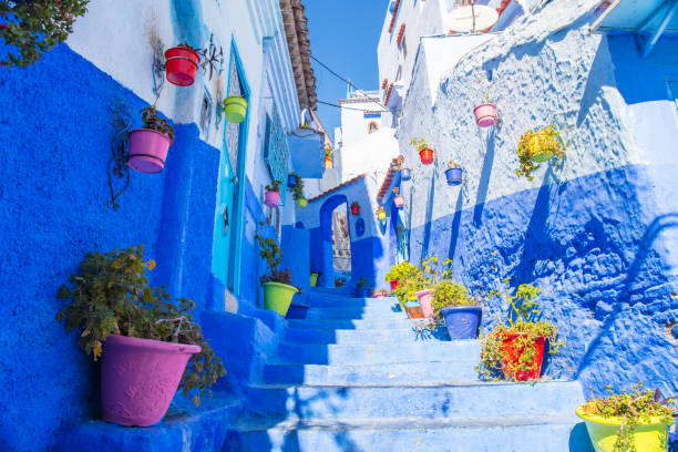 Chefchaouen's fantastic blue wall I shot the fantastic blue wall of Chefchaouen colour enhanced stock pictures, royalty-free photos & images