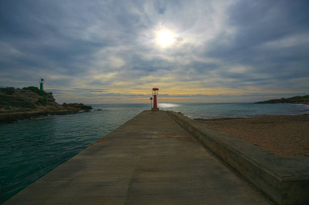 istock Lighthouse sited in a coast of Spain 895103810