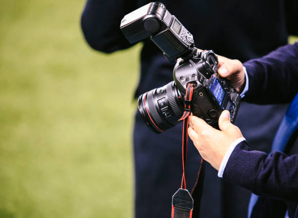 istock Photographer set up his camera 895103950