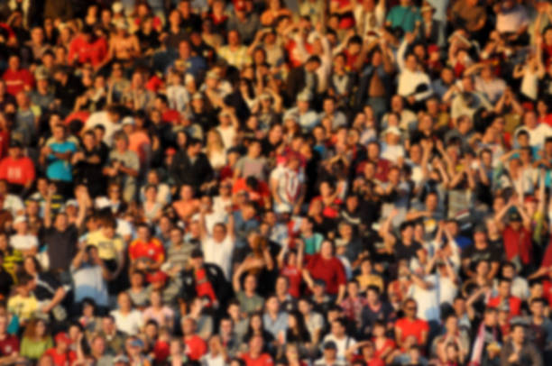 istock Blurred crowd of spectators in a stadium 895119688