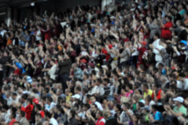 istock Blurred crowd of spectators in a stadium 895119710