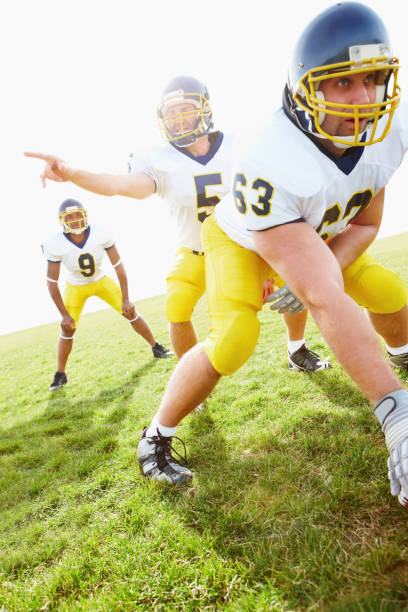 istock Three young sportsmen playing rugby 89512457