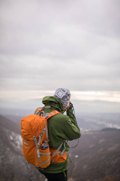 istock Photographer hiker in nature 895150226
