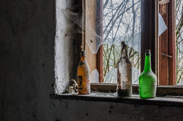 istock three colorful bottles near a window 895156016
