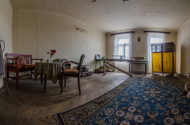 istock furnished room in abandoned house panorama 895156218