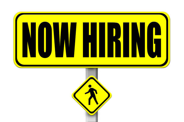 istock Yellow signboard with the words Now Hiring isolated 895173984