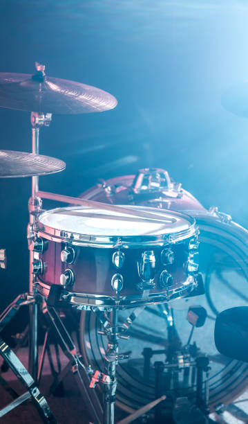 istock musical instruments drum kit, flash of light, a beautiful light in the background with copy space 895174128