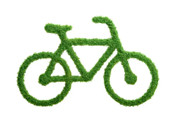 Photo of Green grass eco bicycle isolated