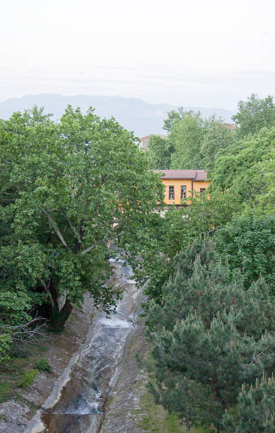 istock Irgandi bridge from park and river in Bursa, Turkey 895222946