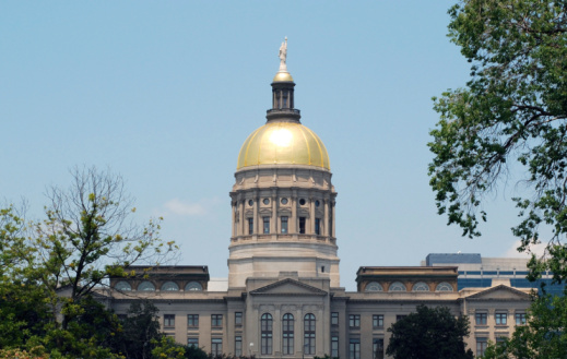 Aerial view of the New Jersey State Capitol Building in Trenton with American Flag