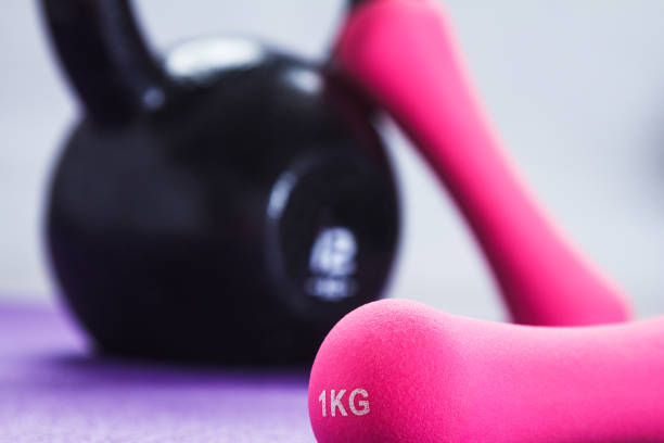 istock Kettlebell, dumbbells and yoga mat 895260758