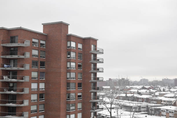 istock Modern condo buildings with huge windows and balconies 895260798