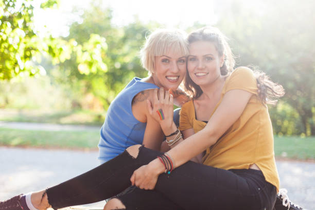 istock Girls resting in park 895263000