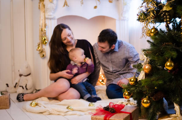 istock Happy family in Christmas time 895263134