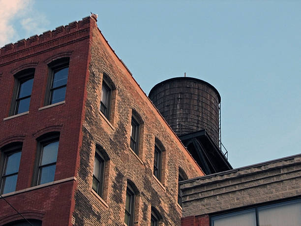 istock Looking Up at Multistory Warehouse and Water Tank 89527325